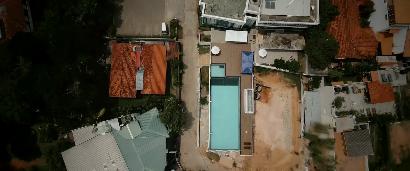 Aerial film of the OSMO Fitness estate and rooftop pool, Pelawatte
